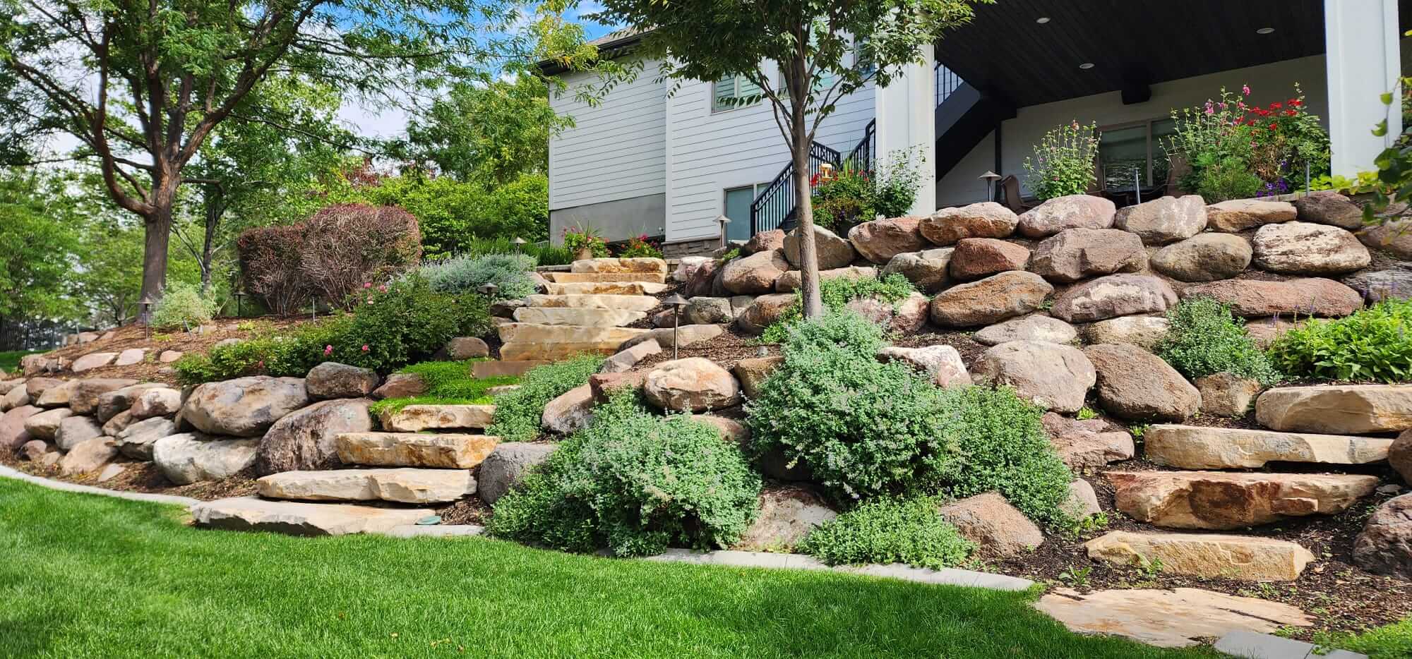 Tiered retaining wall with landscaping